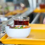 Fipe Parma alla mensa Caritas: chef in cucina per la solidarietà