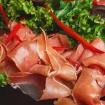 Prosciutto di Parma DOP: storia e disciplinare